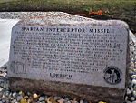 Spartan missile descriptive monument at base of replica missile